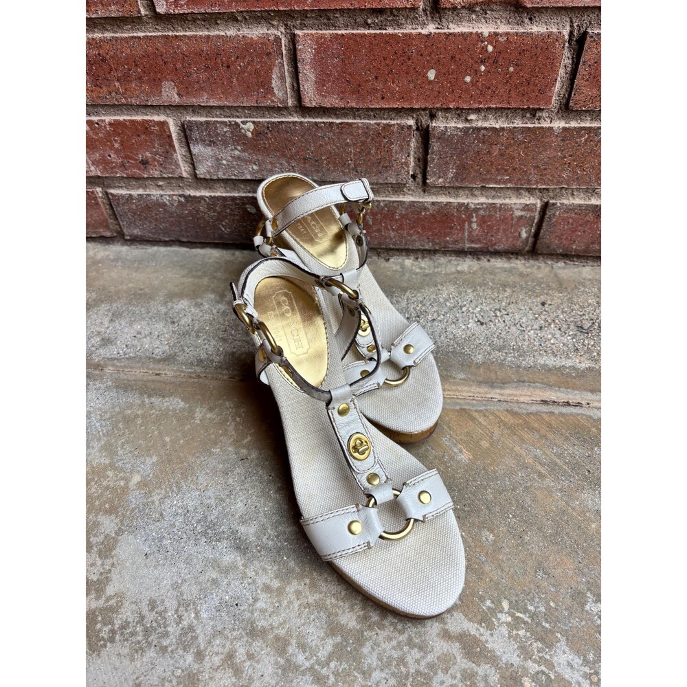 Coach Mercy Beige Patent Leather Platform Sandal with Gold Cork Heel.